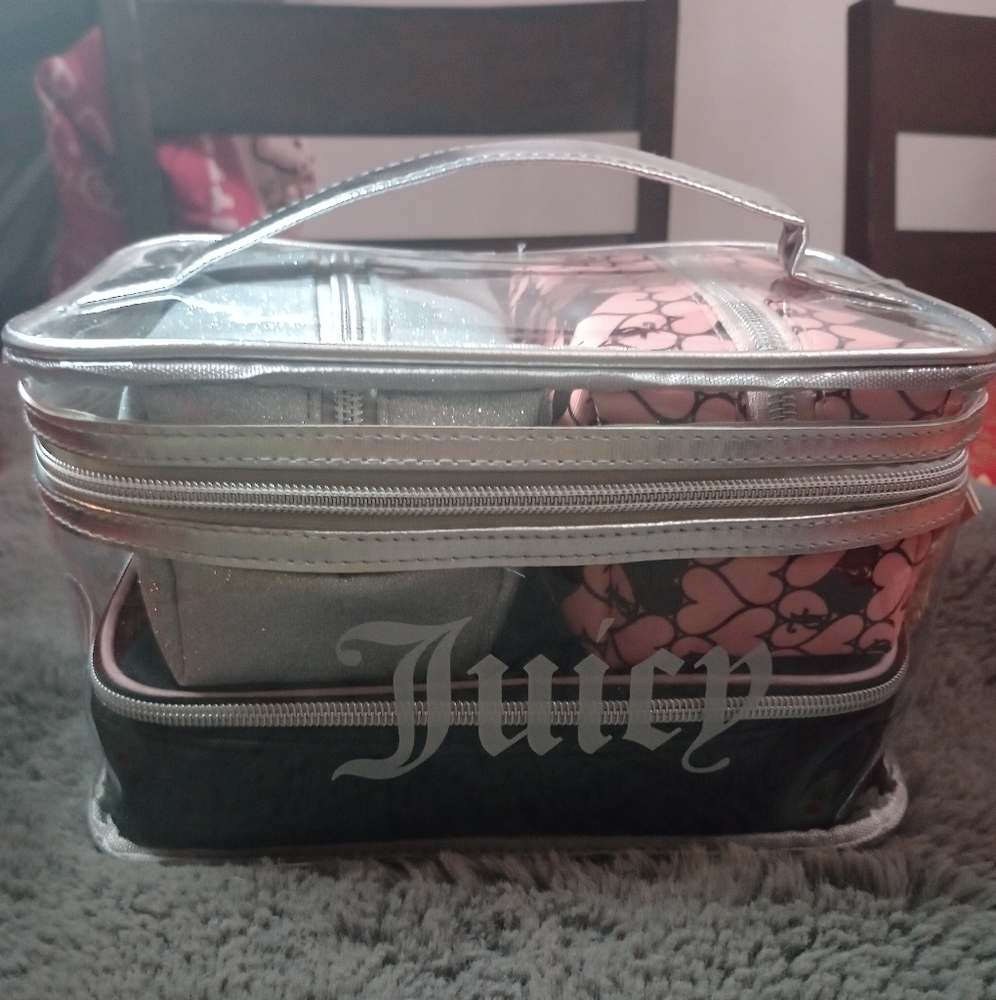 Juicy Couture 4 piece Nested bag set .